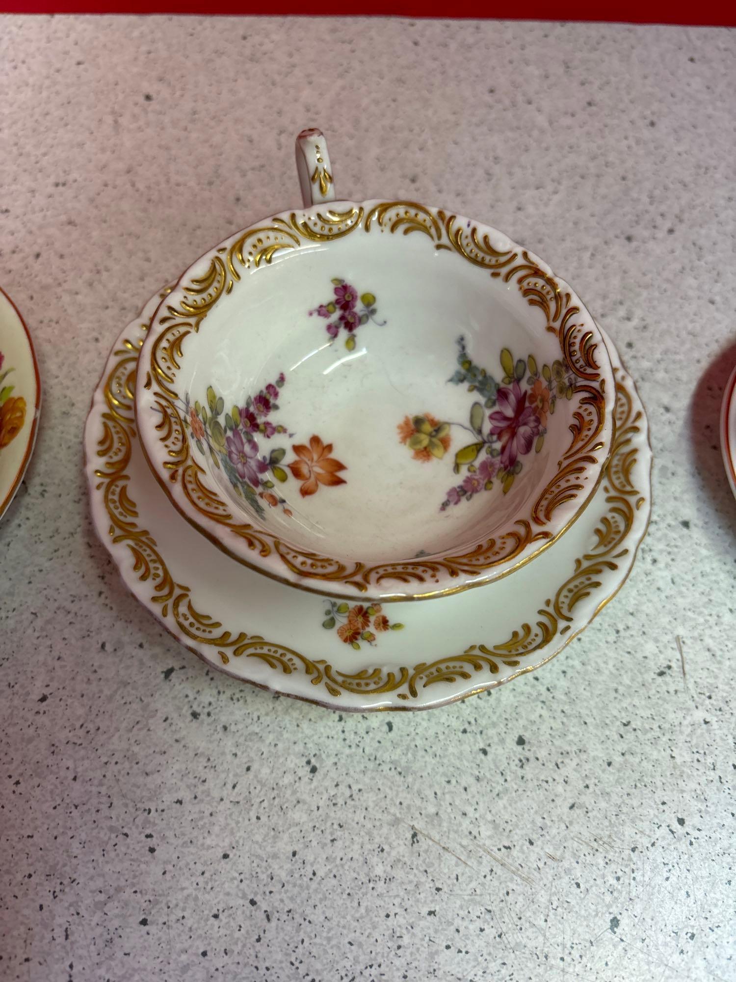 11 cup and saucer sets