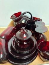assortment of Ruby red glass sugar bowl pitcher plates goblets