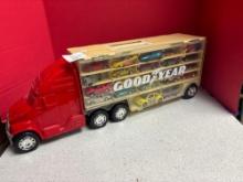 Goodyear car carrier with cars