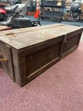 Old wooden trunk previously used as a toolbox