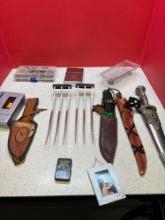 miscellaneous ammunition cassette player king-size lighter knives