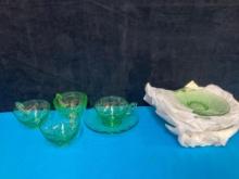 Green depression glass cups and saucers