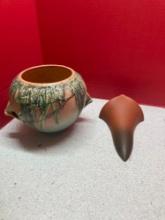 Roseville pottery vase has been repaired and Roseville wall pocket
