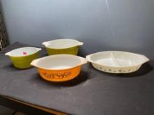 Four Pyrex bowls, casserole dishes
