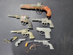 Cap Guns Several older cap type guns, unsure of condition, various styles and brands.