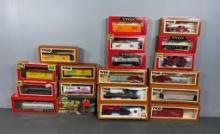 Collection of Tyco Railroad Engines and Cars In Original Boxes