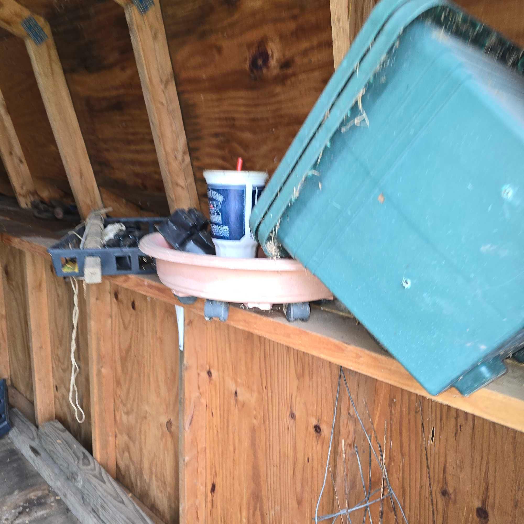 contents of two sheds. plastic and metal pipe - tubs and planters - hardware - lawn tool stand -