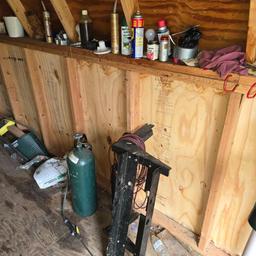 contents of two sheds. plastic and metal pipe - tubs and planters - hardware - lawn tool stand -