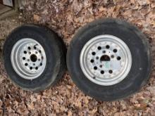 pair Good Year Wrangler HT P235/75R15 tires with Alum rims