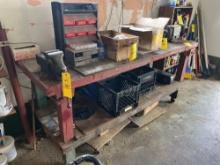 Wooden work bench with bench vice