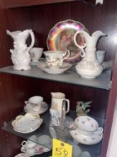contents inside cabinet; glassware tea cups, coffee mugs, plates
