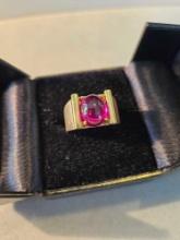 10k yellow gold ring with synthetic oval cabochon ruby.