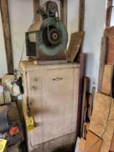 Vintage Frigidaire refrigerator loaded with welding rod, accessories and squirrel cage fan
