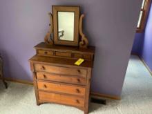 Wooden dresser with vanity mirror