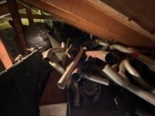 contents in attic of garage, mufflers, radiators, piping, automobile parts