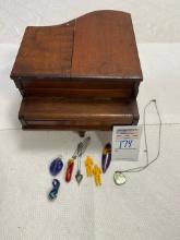 Piano music box with contents