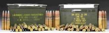 LOT OF 50 BMG AMMO & 4 AMMO CANS.