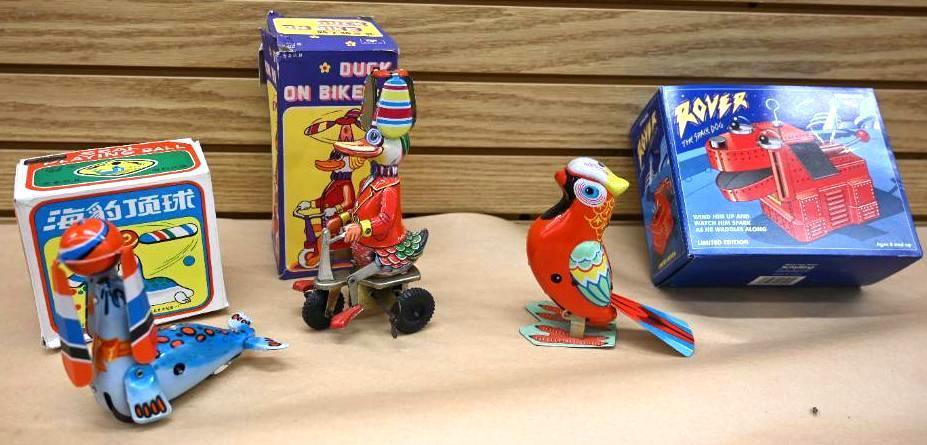 Four Vintage Tin Toys