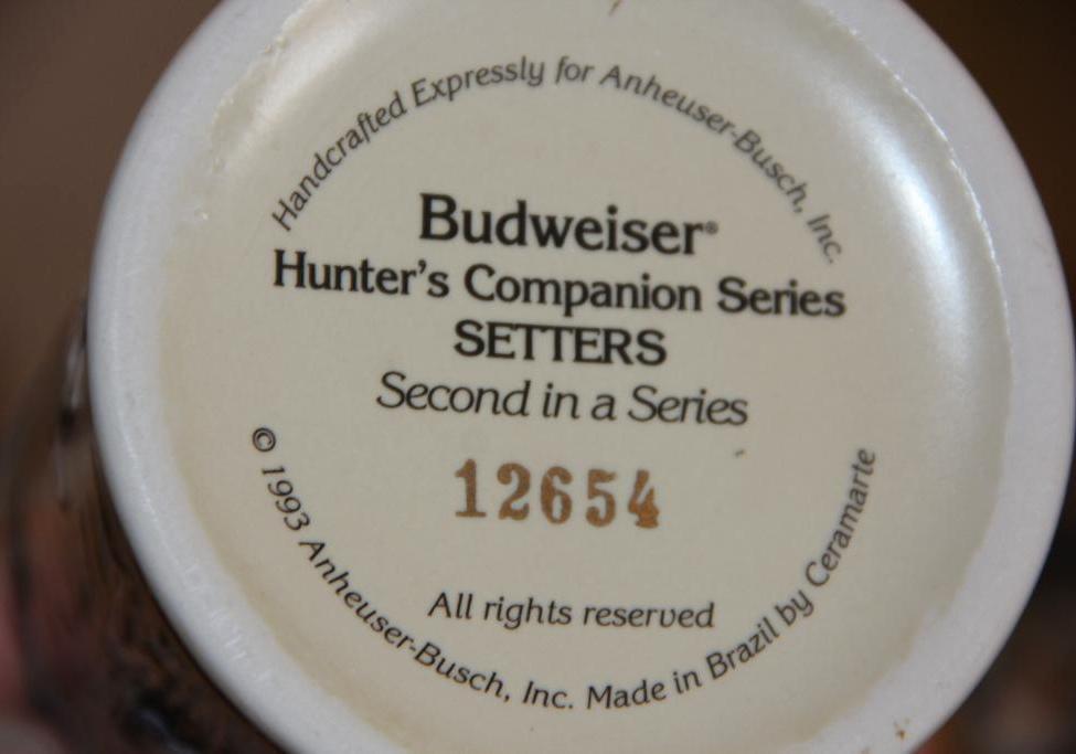 Seven Collectible Steins by Budweiser, First Hunt, and One Music Box Stein