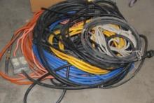 Large Pile of Heavy Duty Electric Cords and Hose