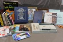 Catchall Assortment of Books on Tape, Books, Office D?cor, and more