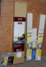Four Packs of Blinds and 1 Box Vinyl Wall Base