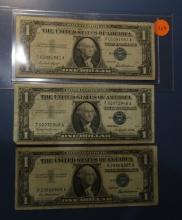 LOT OF THREE 1957 $1.00 SILVER CERTIFICATE NOTES AVE. CIRC. (3 NOTES)