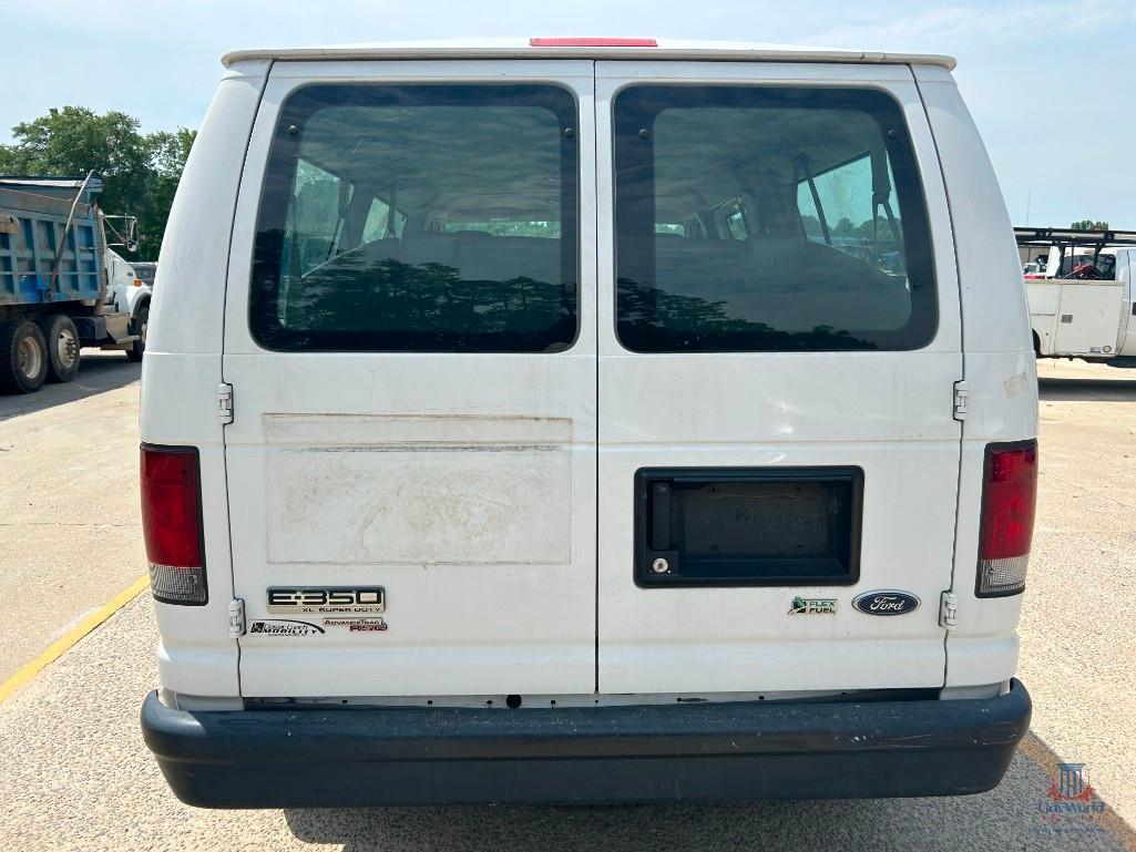 2009 Ford Econoline Wagon Van, VIN # 1FBNE31L99DA45904