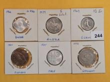 Six mixed World Coins
