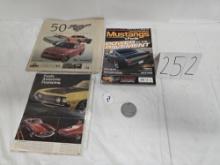 Group Of Ford Mustang Magazines/ Advertisements And Medallion From Rawsonville Open House Ford 1996
