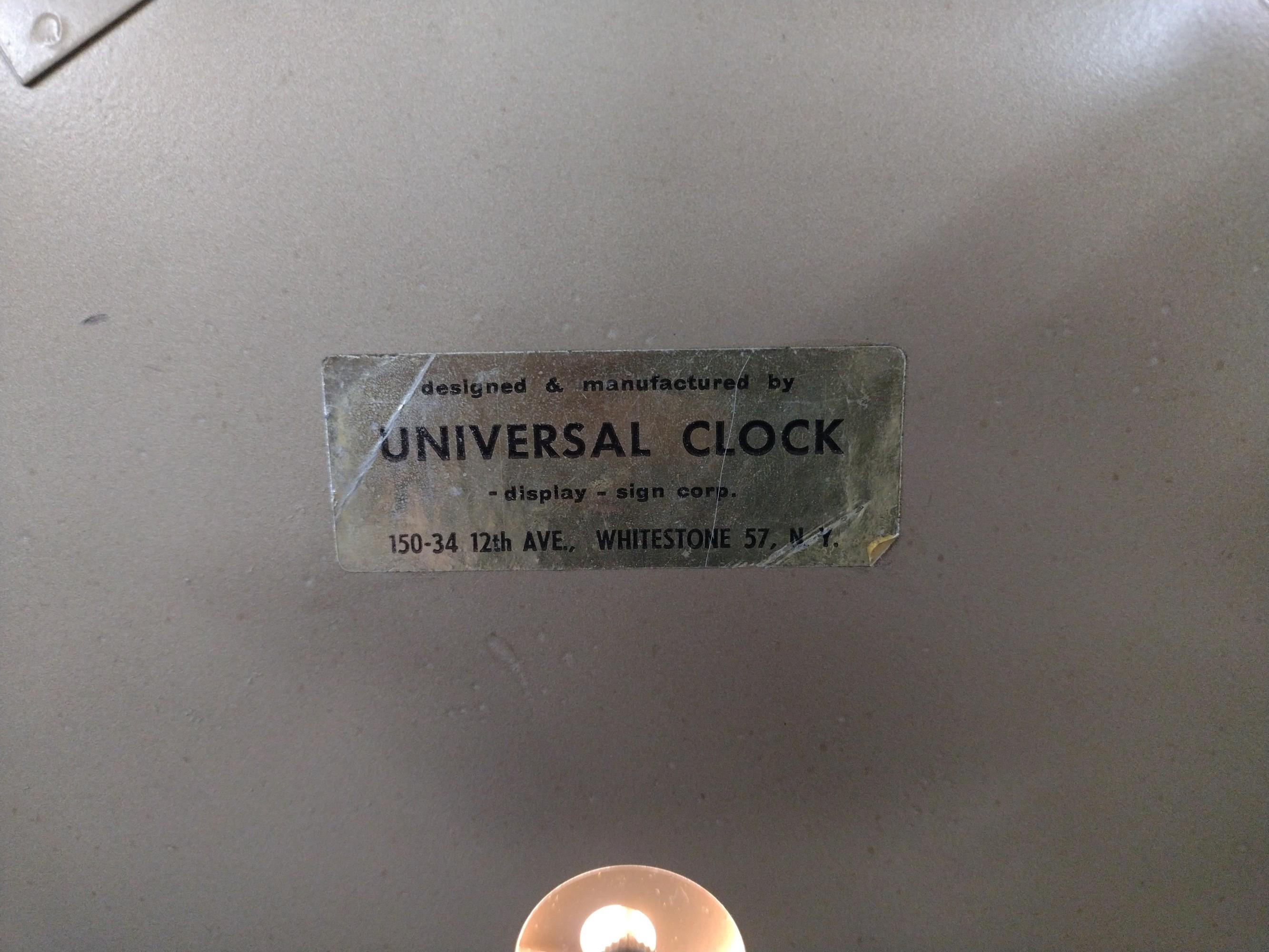 Universal Sinclair Lighted Advertising Clock