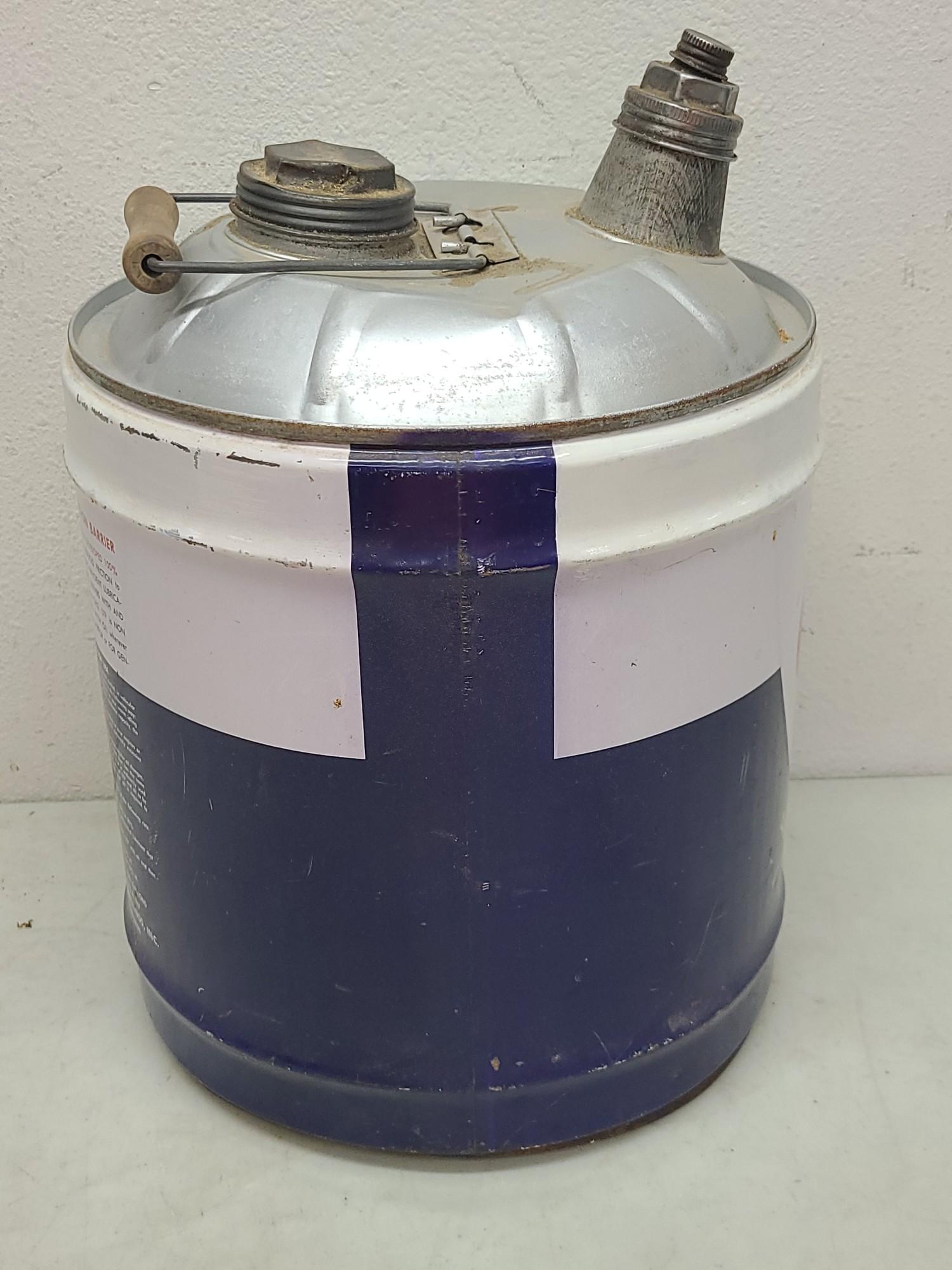 Two 5 Gallon Motor Oil Cans