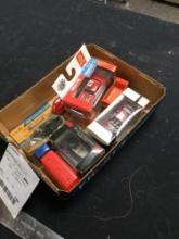 box of seven vintage, diecast cars in boxes