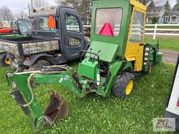 John Deere 2210 4WD compact diesel tractor with loader, backhoe, cab, 1333 hrs