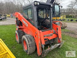 Kubota SSV75 skid loader, hand and foot control, power wedges, 2-speed, cab, heat, A/C, 8805 hrs.