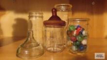 Assorted vintage...milk...bottles...and baby bottles. Marbles in one jar.