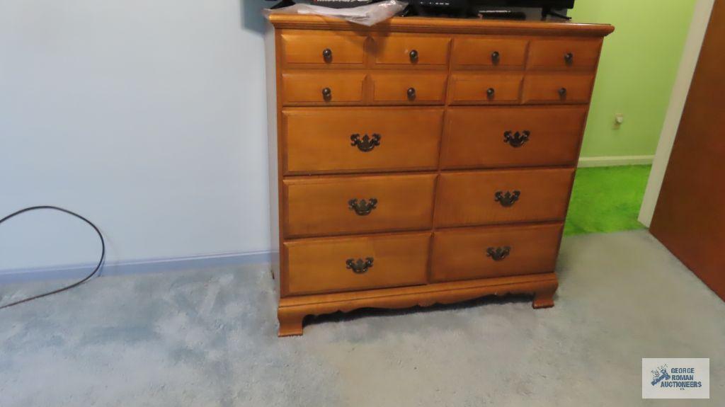 Early American style dresser with mirror and chest