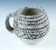 4 1/4" tall x 6" wide Anasazi Handled Cup with some restoration. Montezuma Co., Colorado. COA.