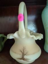 (LR) FENTON RUFFLED VASE WITH BASKET HANDLE, FEATURES A HAND PAINTED TREE, AND SIGNED ON THE BOTTOM,