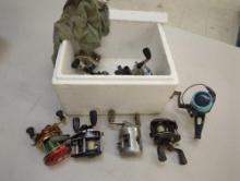 ProPak foam cooler and contents including various fishing reels. Comes as is shown in photos.