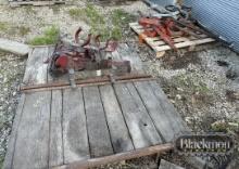 (2) WAREHOUSE RACKS, FIRE EXT HOLDERRS & MISC TRACTOR PARTS