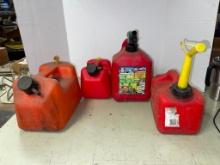 Group of Four Small Plastic Gasoline Cans