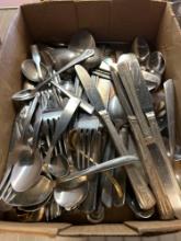 box of stainless steel flatware