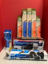 Two new RV sewer hose kits, RV water filter and five new water tight dry bags