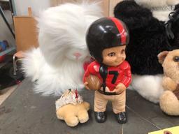 Stuffed animal lot and football player figure